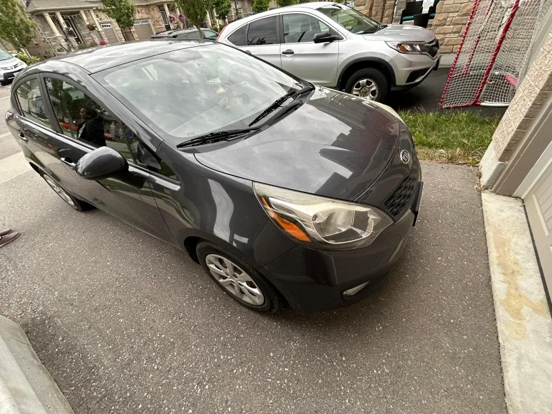 2012 Kia Rio - Grey Sedan - no accident image indicator(2)