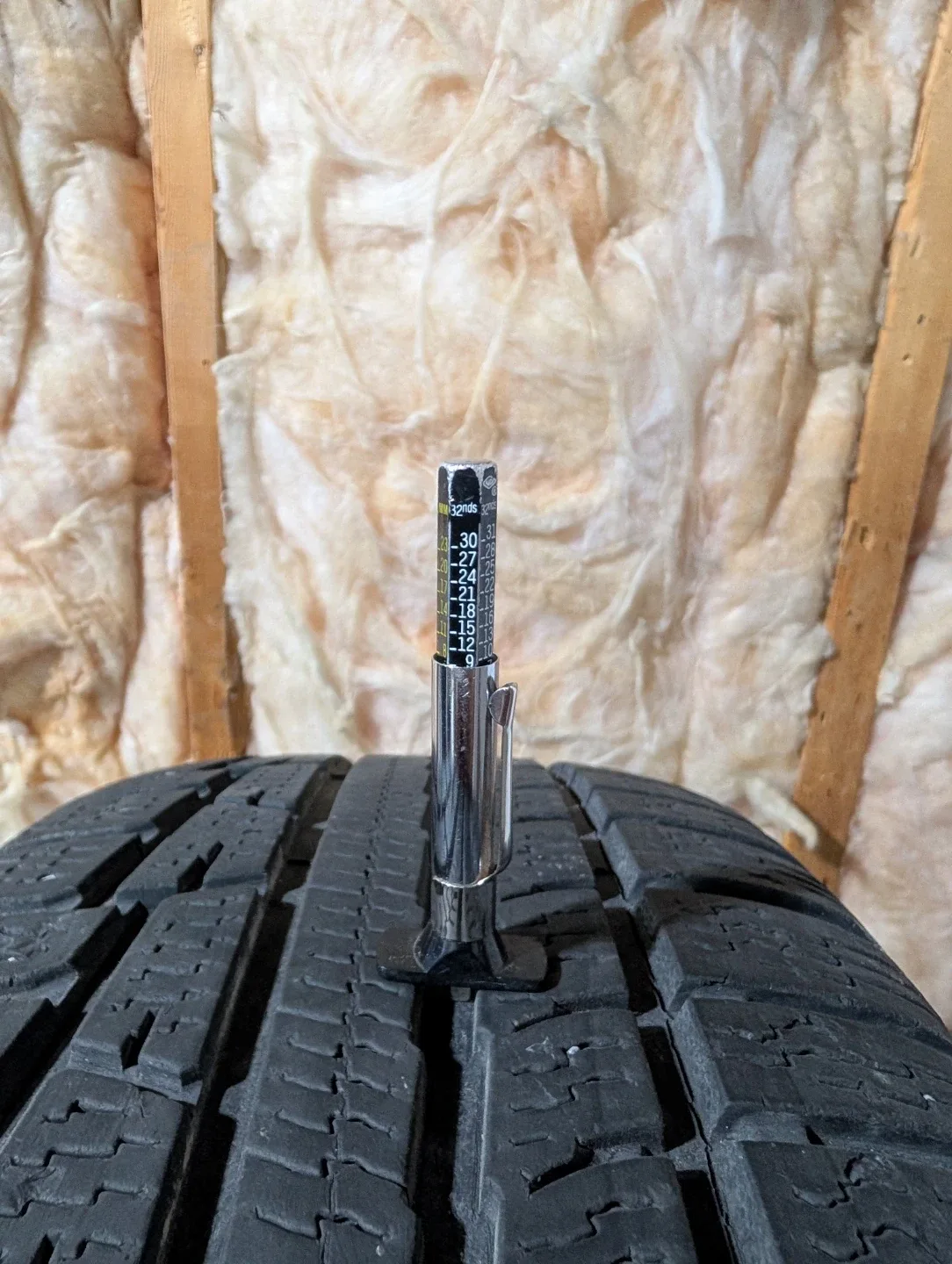 (4)-215/65R17 All Weather Tires On Rims Off 2006 Chrysler 300 image indicator(3)