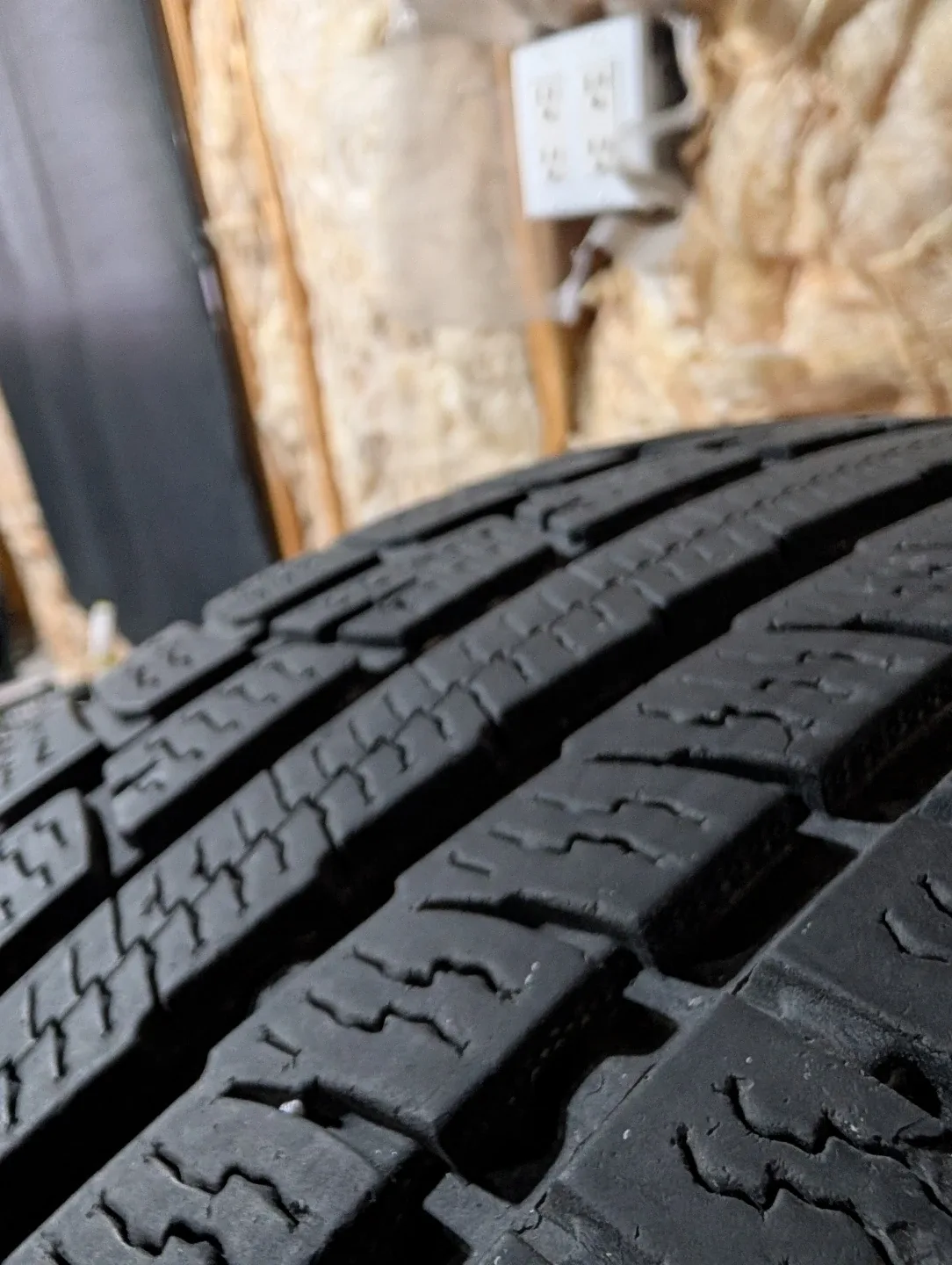 (4)-215/65R17 All Weather Tires On Rims Off 2006 Chrysler 300 image indicator(5)