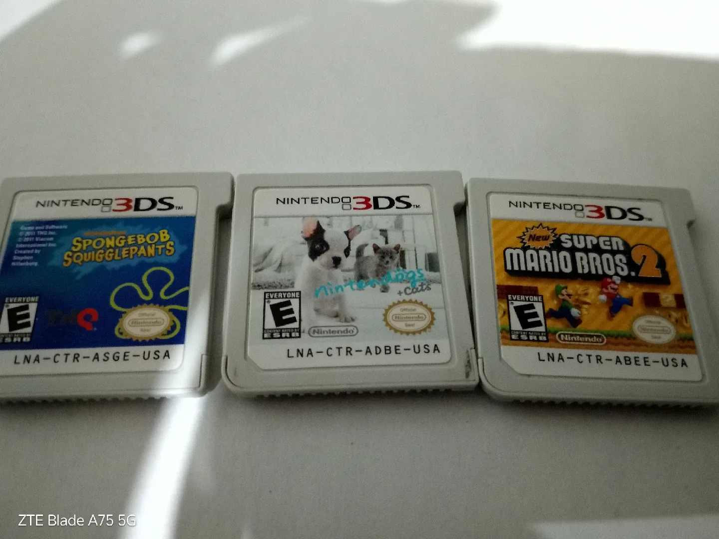 Nintendo 3DS Games: Spongebob, Nintendogs, Super Mario Bros