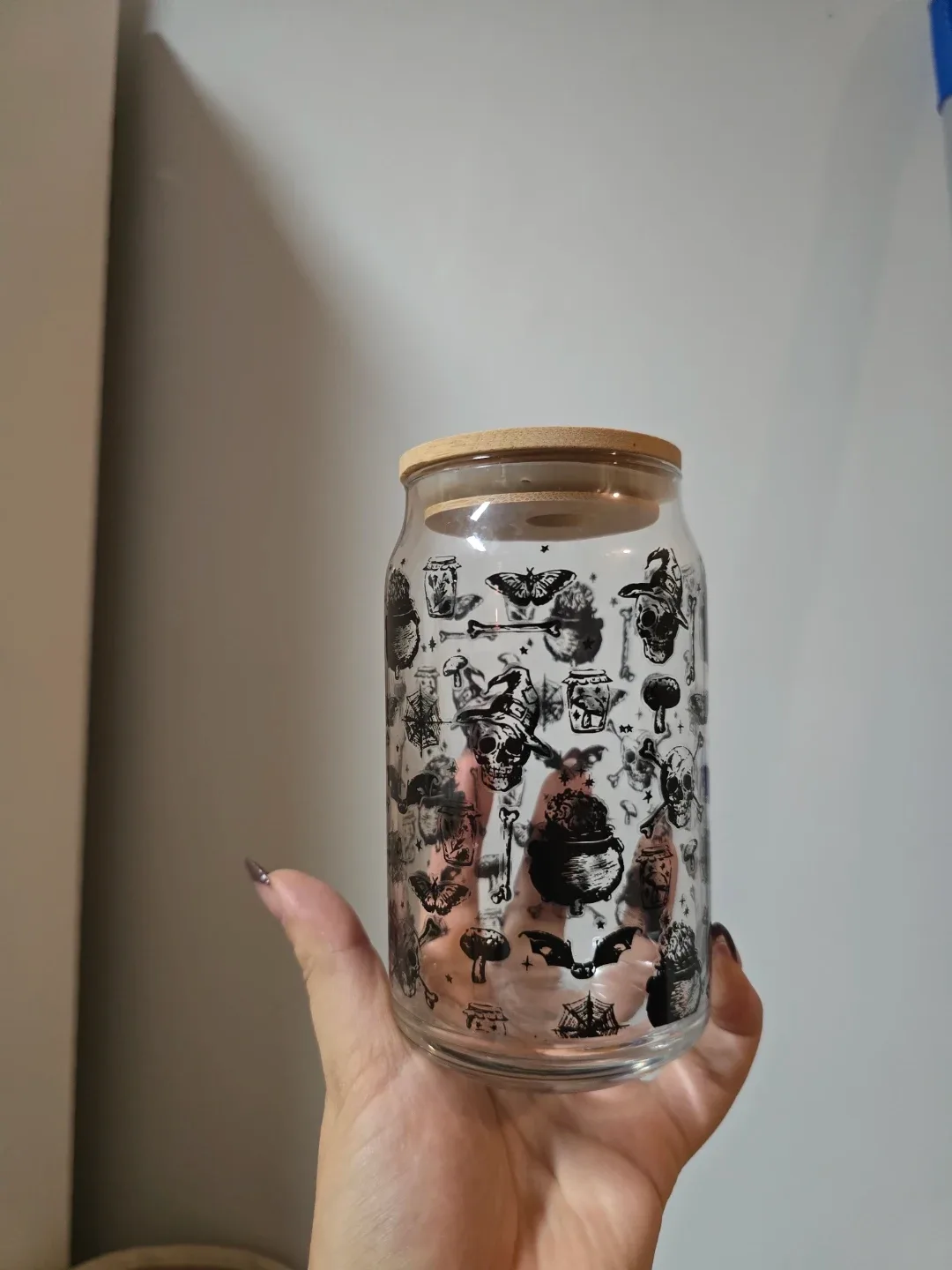 Glass cup with wooden lid