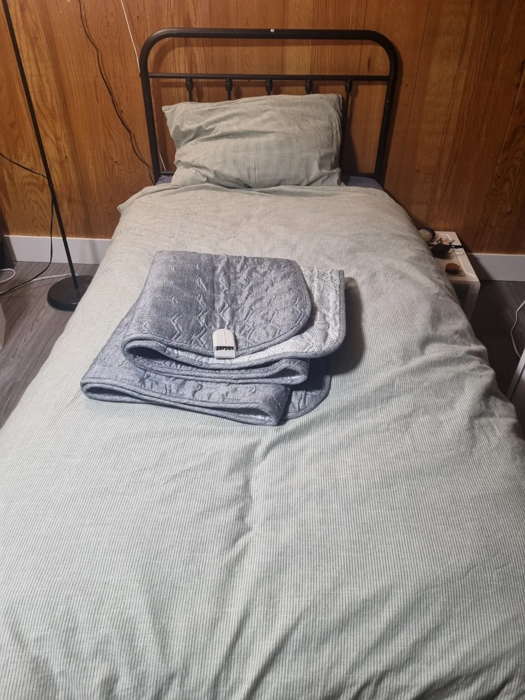 Single Metal Bed Frame, Bedding, and Electric Heating Pad