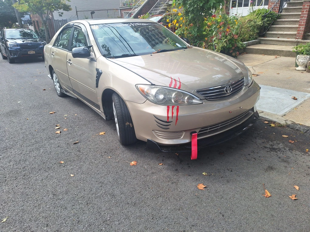 Toyota Camry LE Sedan - Gold