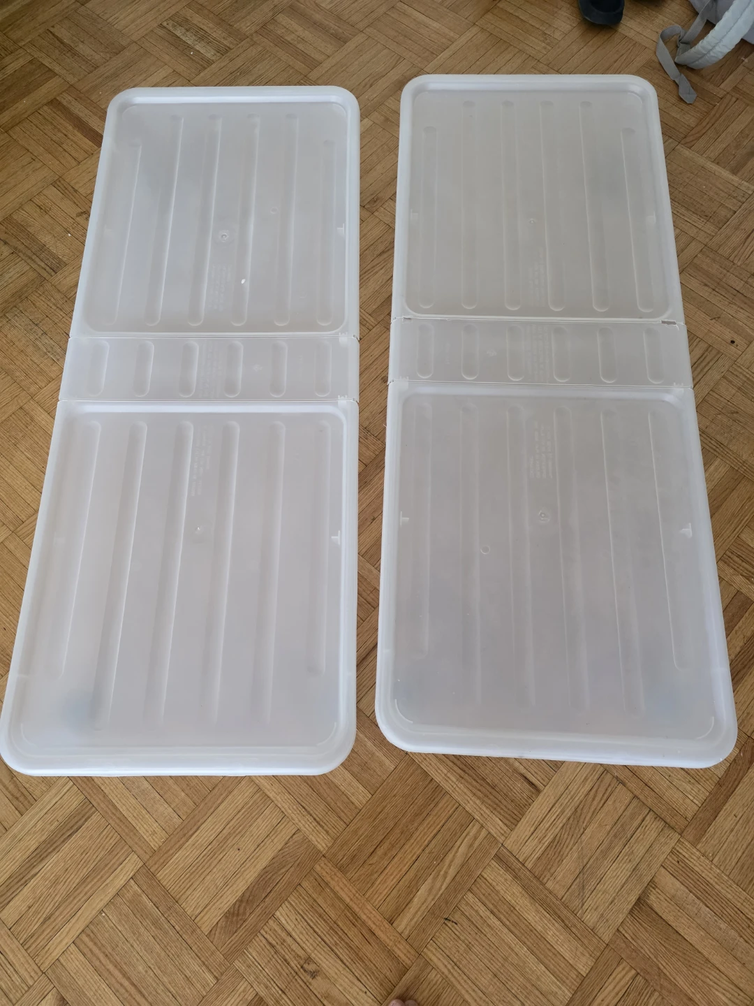 Two Clear Plastic Storage Bins with Lids