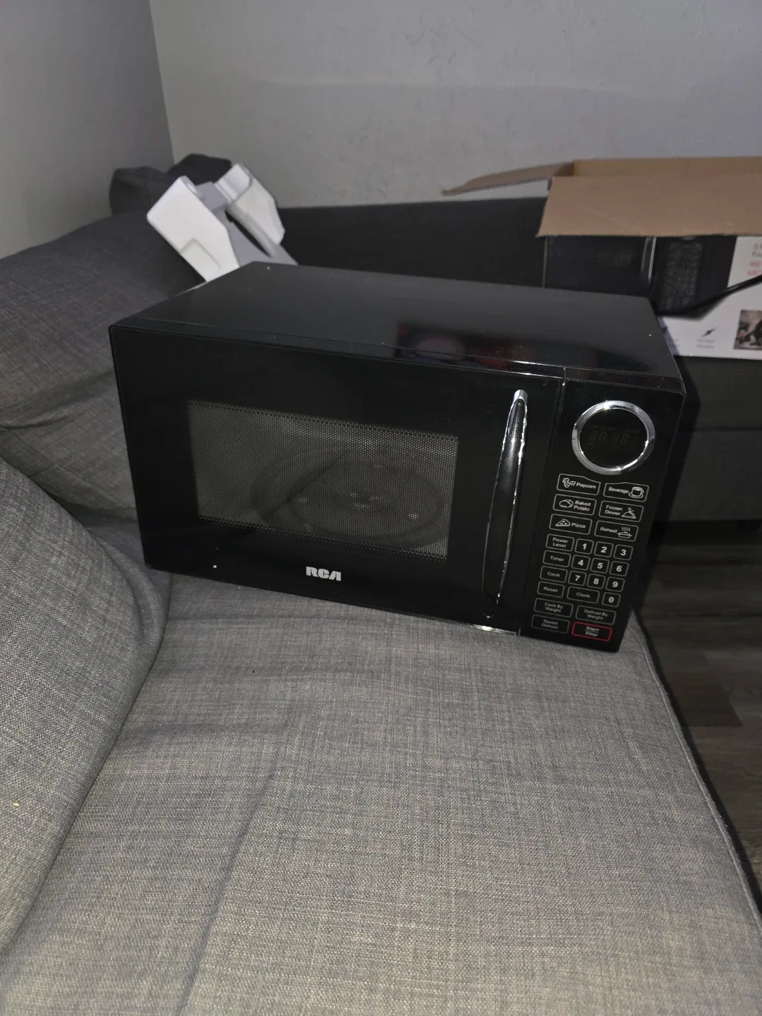 RCA 0.9 Cu. Ft. Microwave - Black image indicator(2)