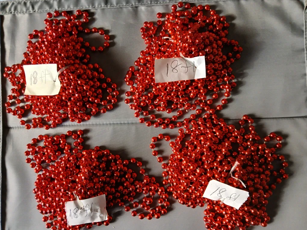 4 Strands of 18 ft each Red Beaded Christmas Garland. ALL $10.
