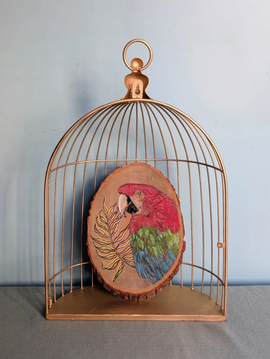 Hand-Burned Macaw on Basswood in Metal Cage