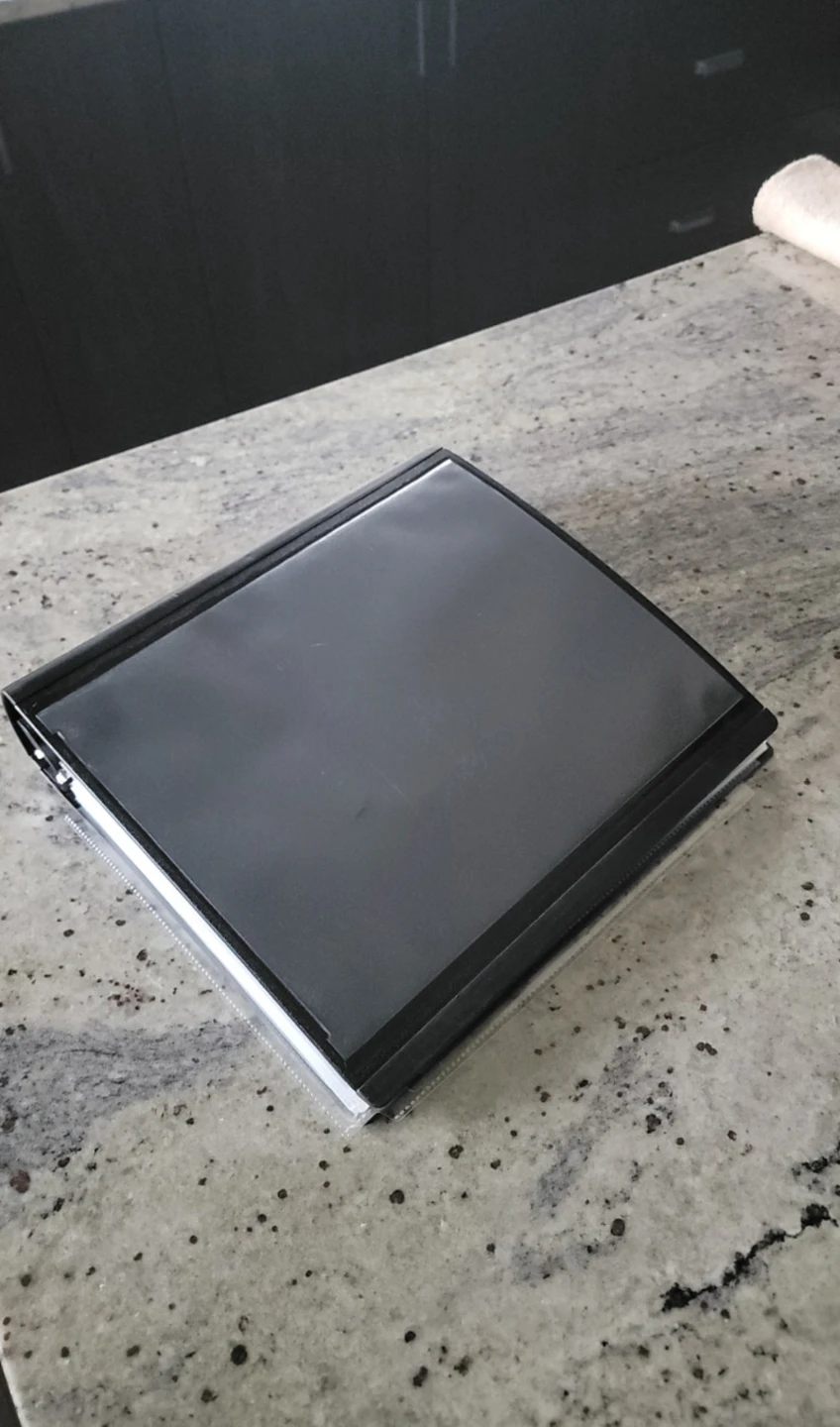Brand new binder never used and full of inserts and added ones