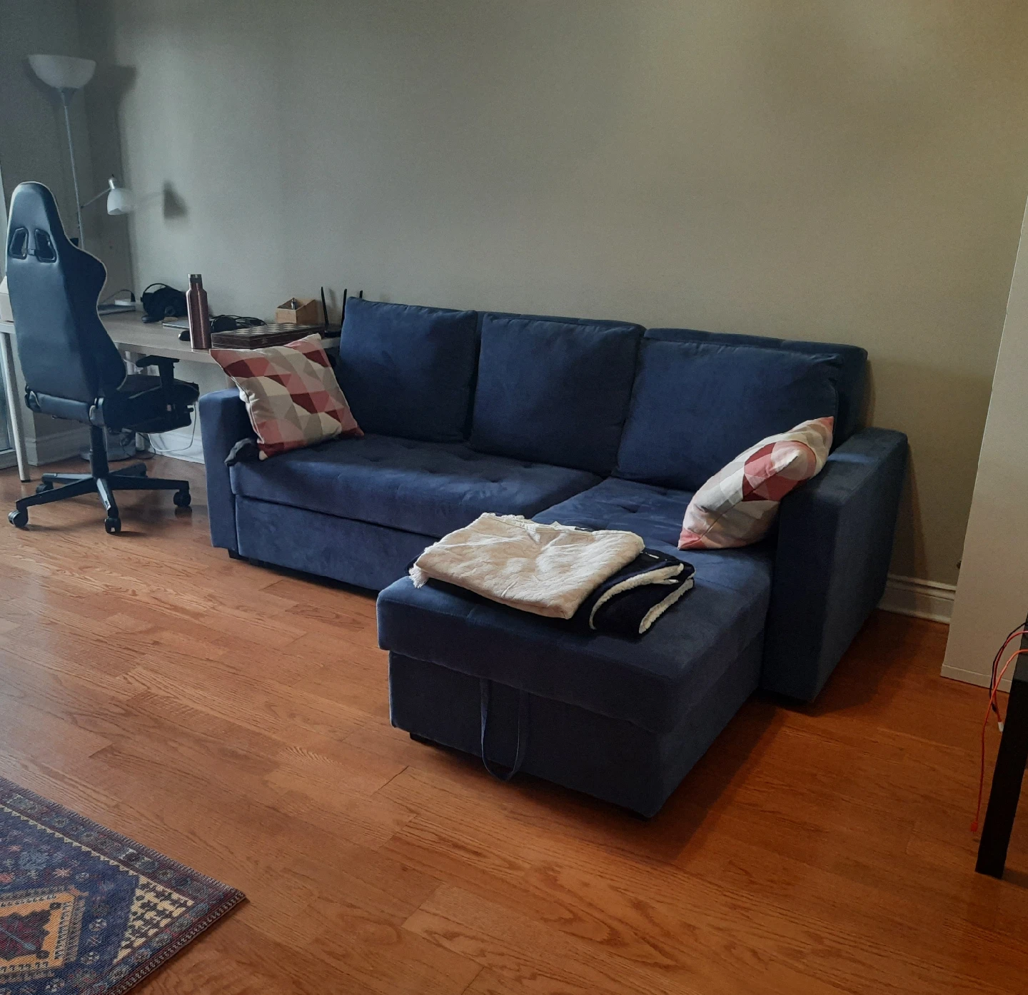 Blue Sectional Sofa interchangable chaise and pull out bed