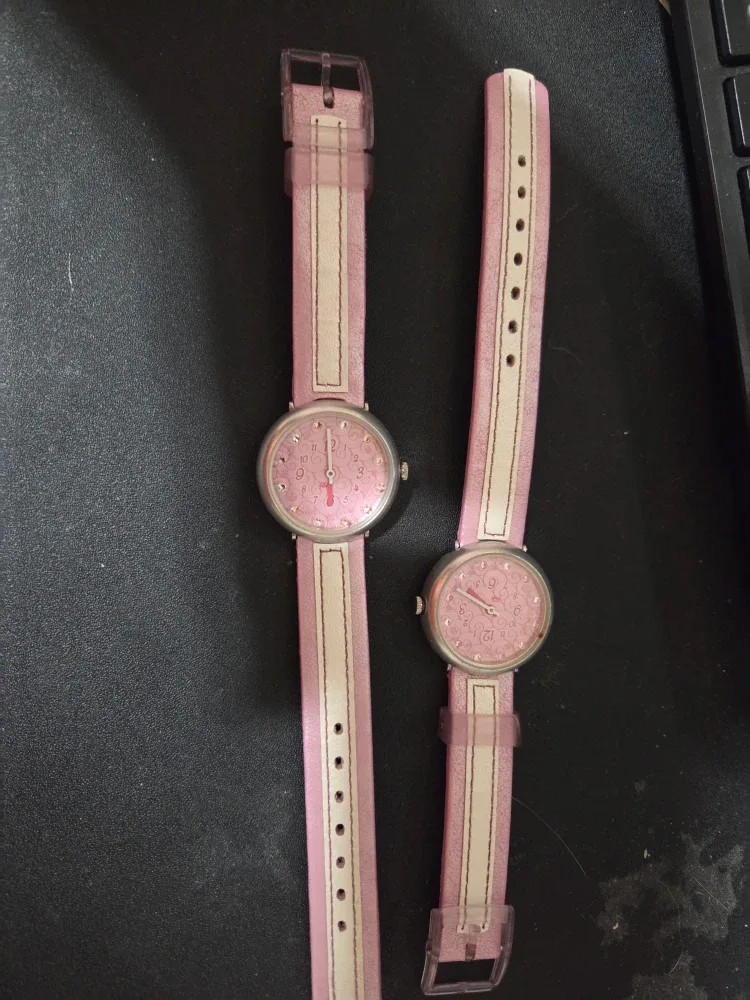 Two Flik Flak Pink Watches