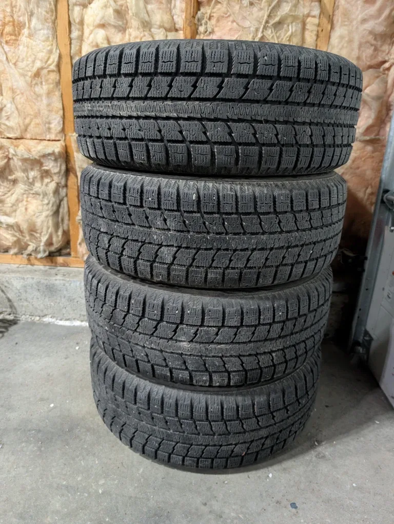 (4)-205/55R16 Winter Tires On Steel Rims Off 2013 Honda Civic image indicator(7)