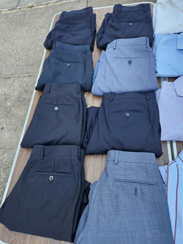 15 pants and shirts. Size 32 and medium image indicator(3)