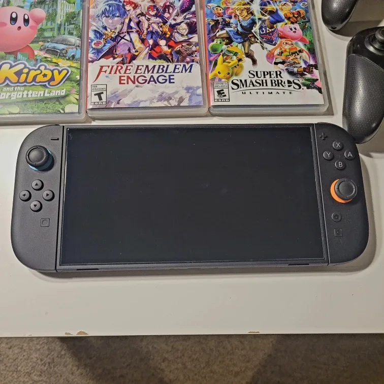 Nintendo Switch 2 Bundle w/2 pro controllers and games image indicator(3)