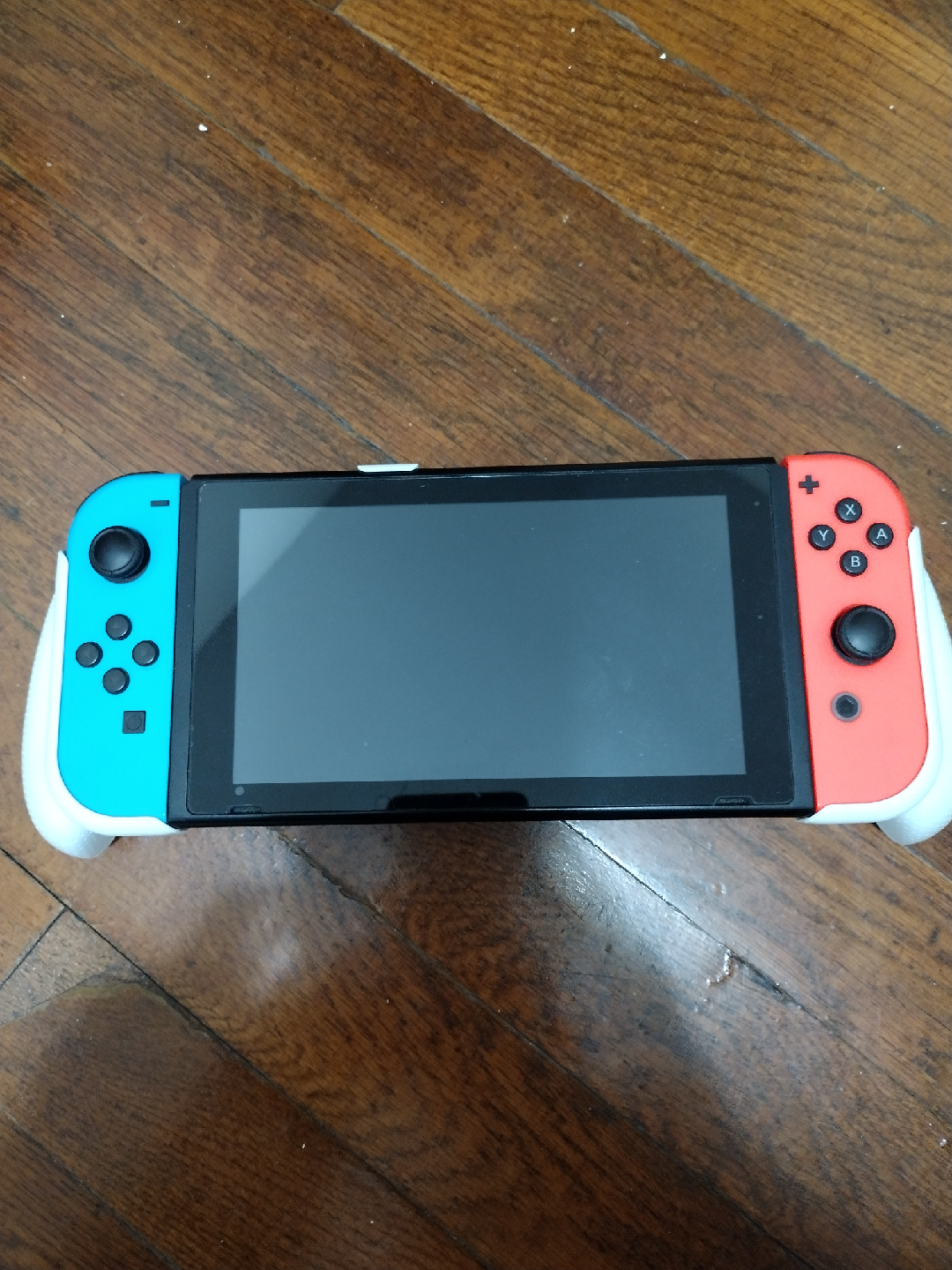 Nintendo Switch with Co Grip and Charger and Pokemon Shield Game