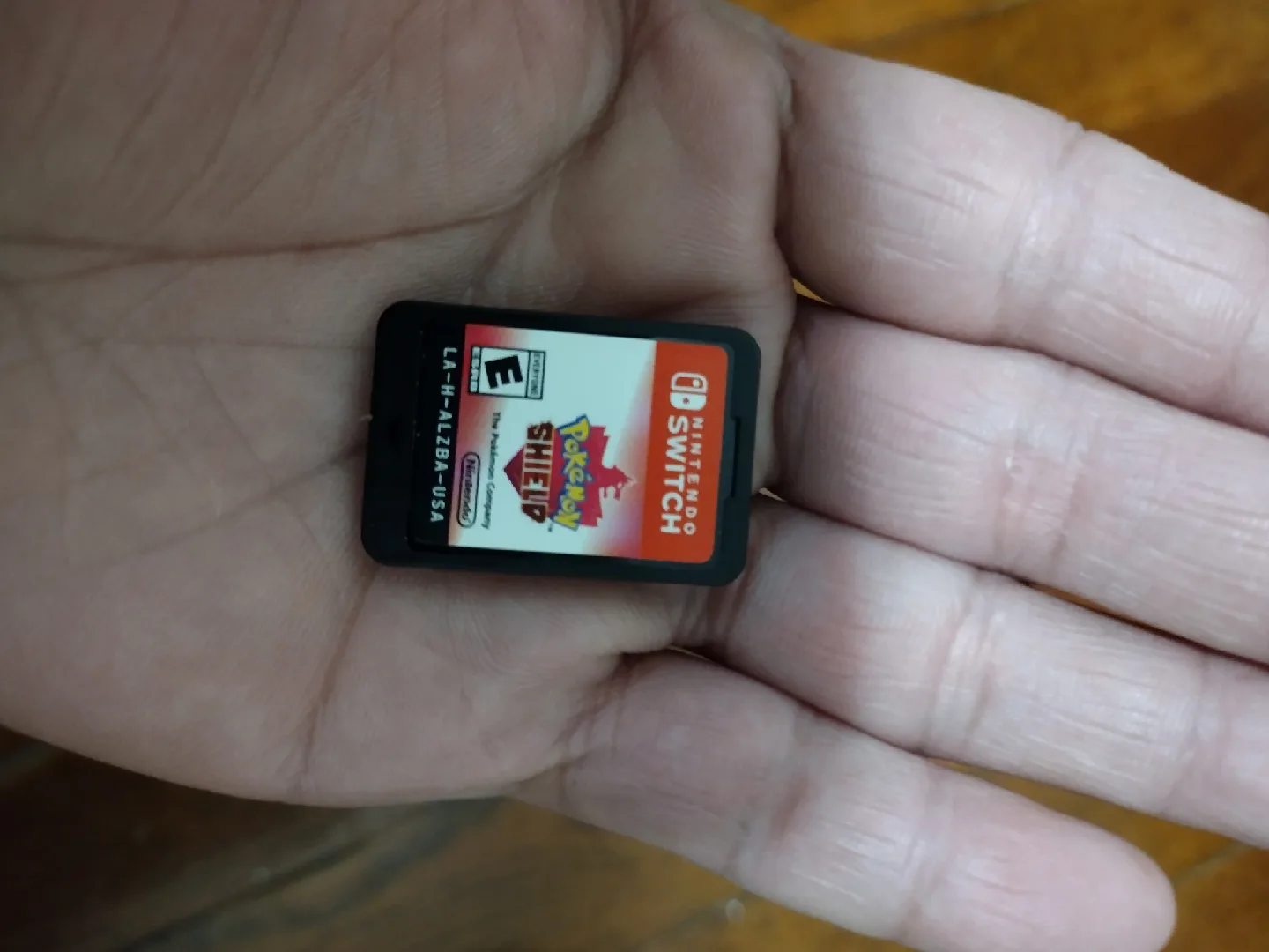 Nintendo Switch with Co Grip and Charger and Pokemon Shield Game image indicator(6)