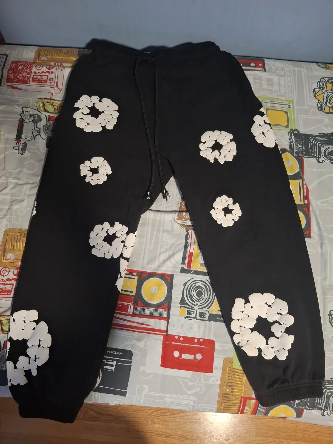 Black and white denim tears sweatpants