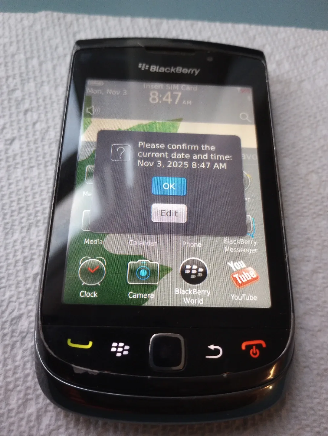 BlackBerry Torch 9800 with leather case image indicator(3)