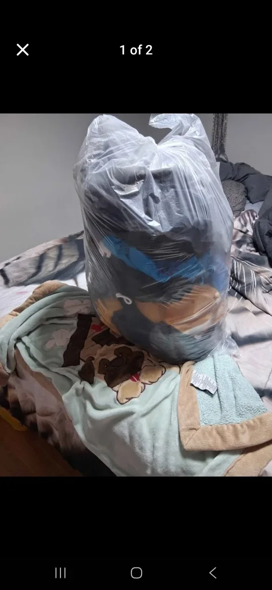 Large bag of men's clothing