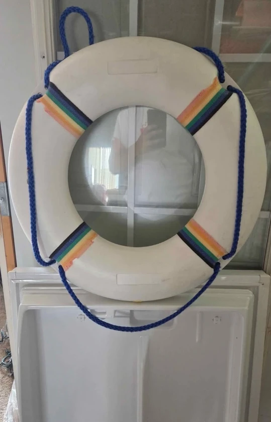 White Life Preserver with Rainbow Accents