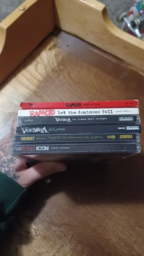 Rancid, Rush, Volbeat, Veil of Maya CDs