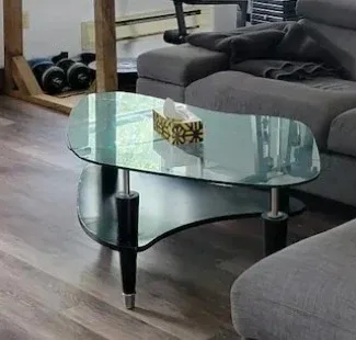 Contemporary modern sleek glass coffee table