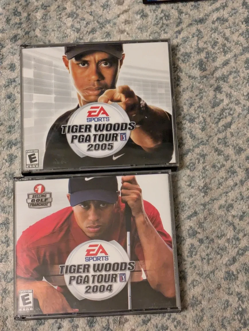 Mixed Lot of PC Games - Tiger Woods PGA Tour, Sims image indicator(8)