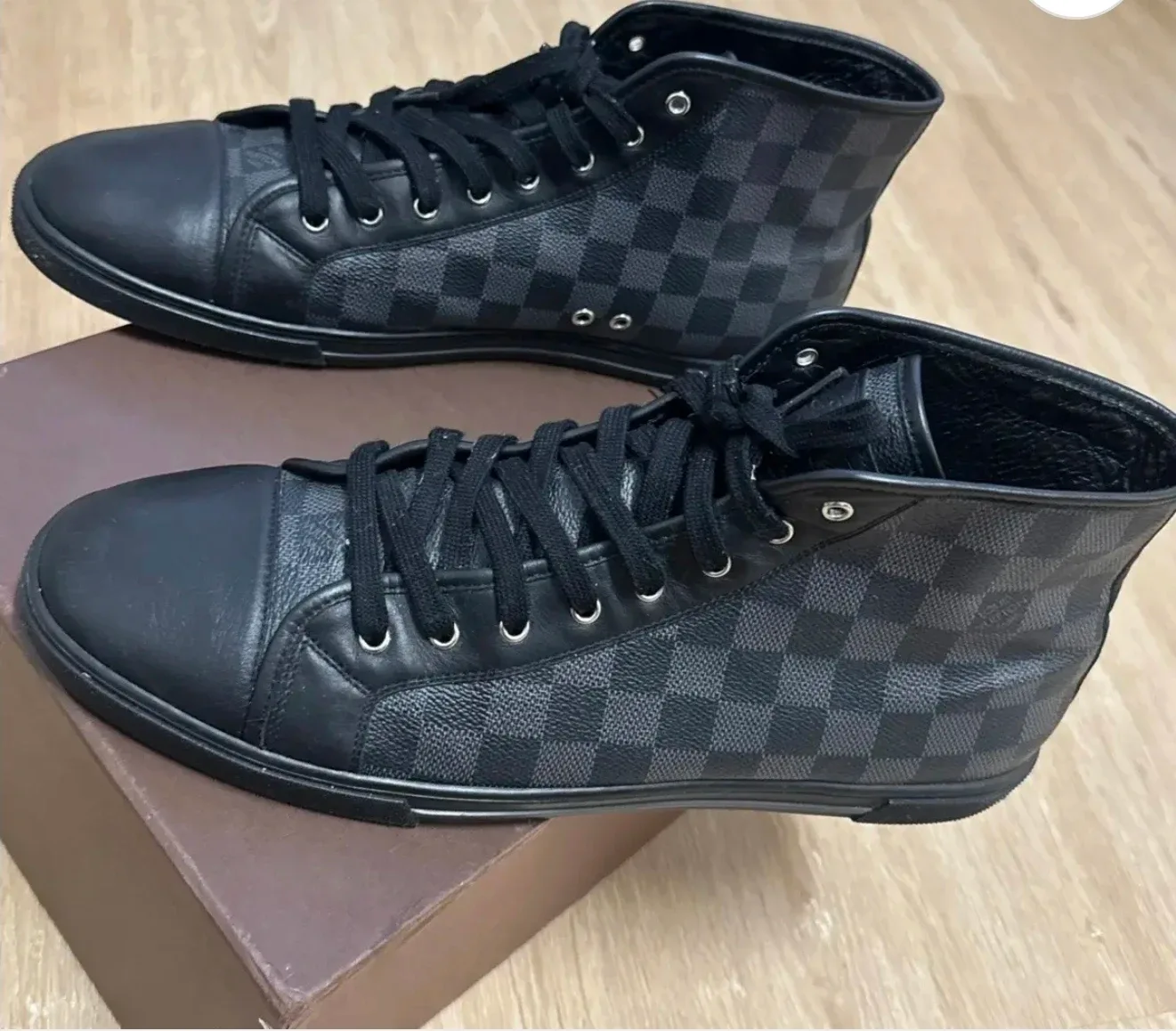 Louis Vuitton Black Leather High-Top Sneakers image indicator(2)