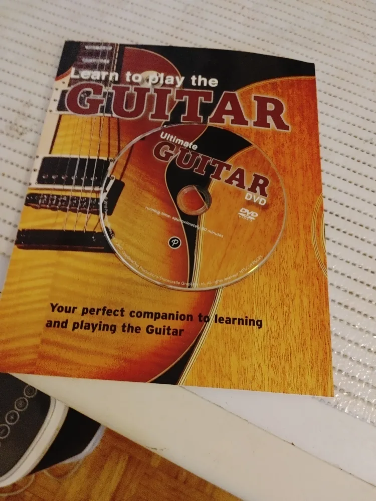 Ultimate Guitar CD & Learn to Play Book