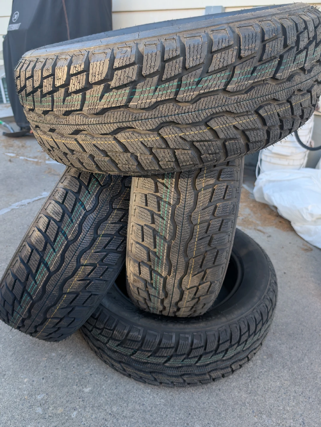 Uniroyal Tiger Paw Ice & Snow 4 - 225/60R17 Tires - photo 3