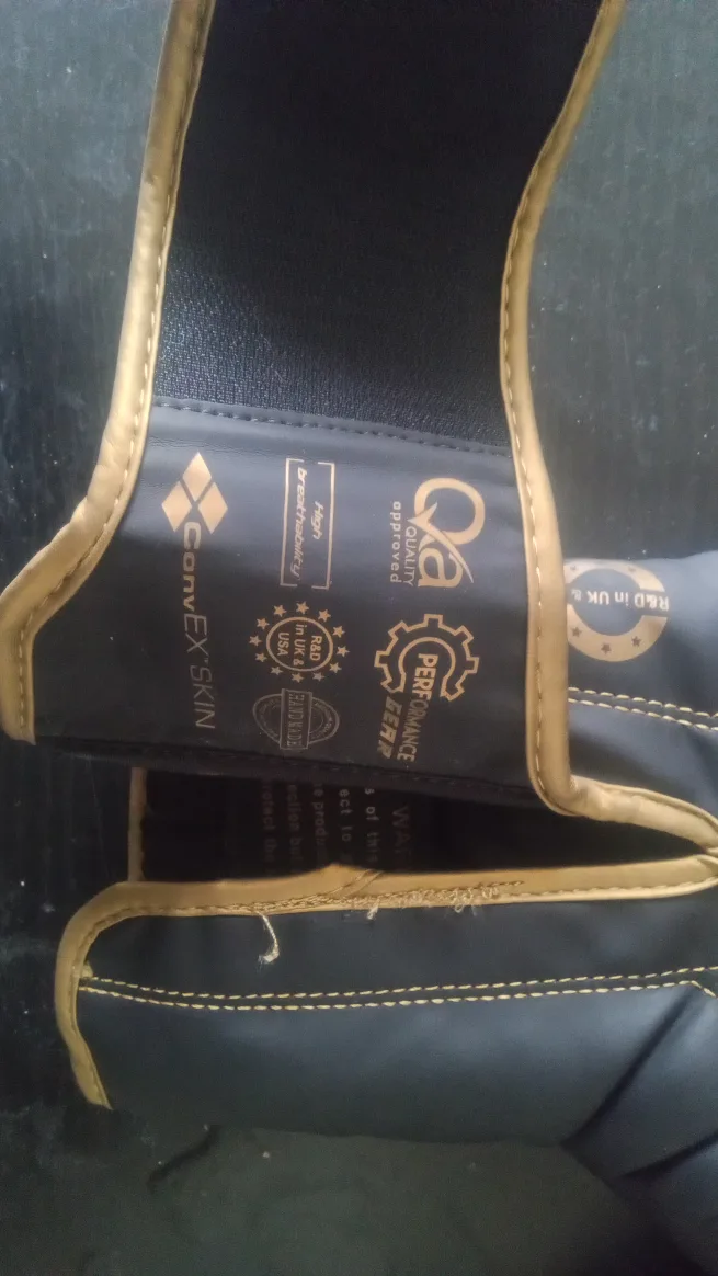 RDX Boxing Gloves - Black/Gold image indicator(4)