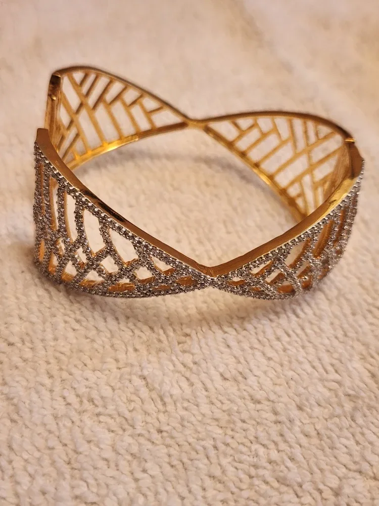 Two Gold Tone Fashion Bangles image indicator(2)