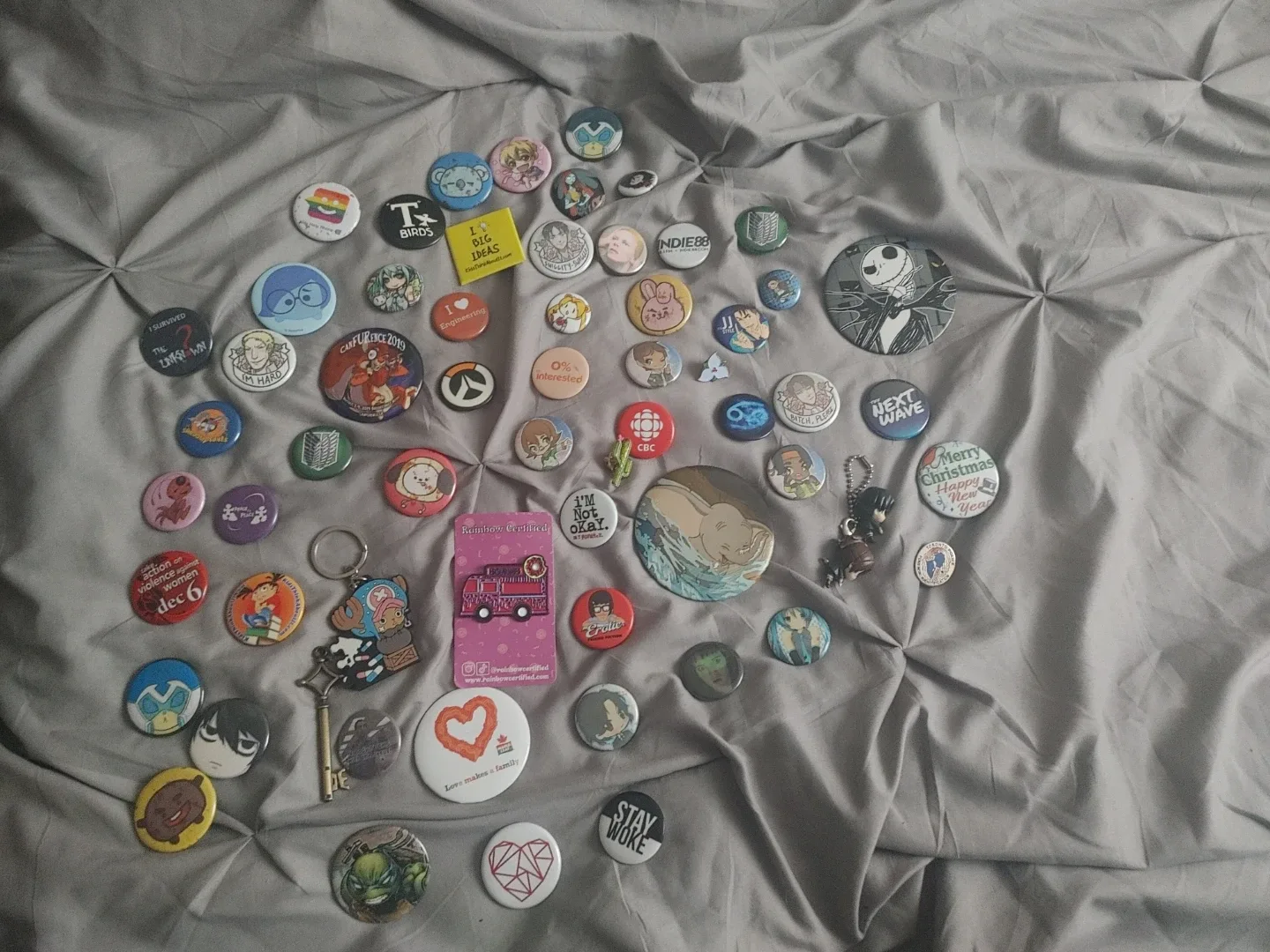 Assorted Anime & Cartoon Character Pins & Keychains