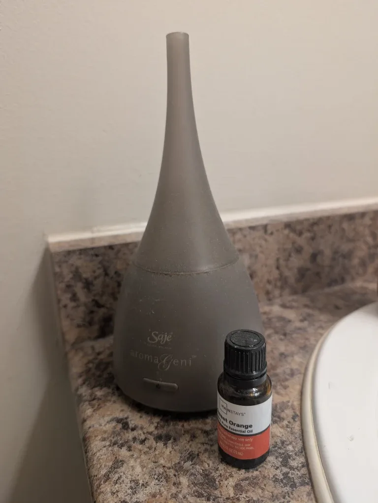 Saje Aroma Geni Diffuser & Mainstays Sweet Orange Oil
