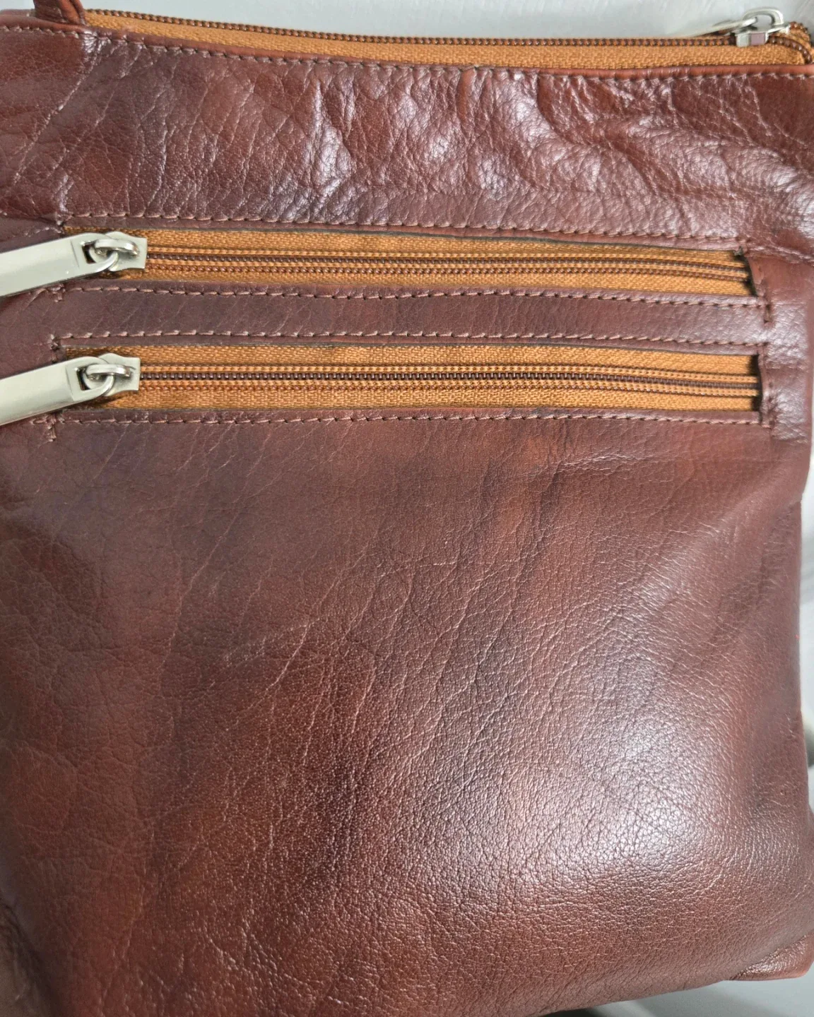 Stylish brown bag with multiple pockets - excellent condition image indicator(4)