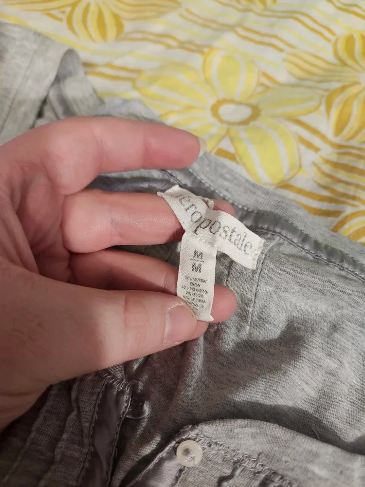 Grey Aeropostale babydoll top with button detailing image indicator(5)