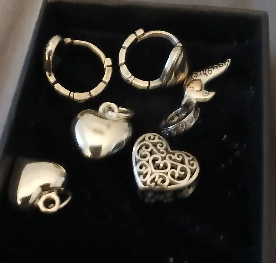 Assorted sterling silver charms