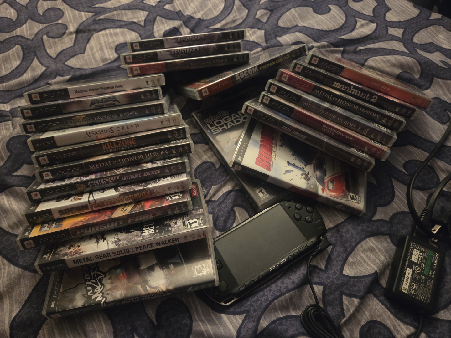 PSP Games Lot with used PSP E-1000 console and charger
