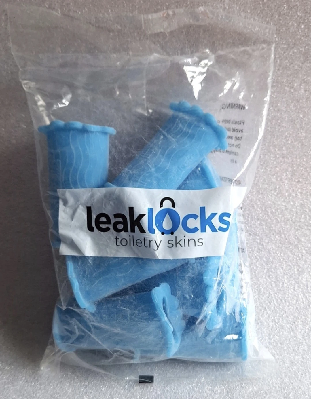 LeakLocks® Toiletry Skins™ Elastic Sleeve for Leak Proofing - photo 2