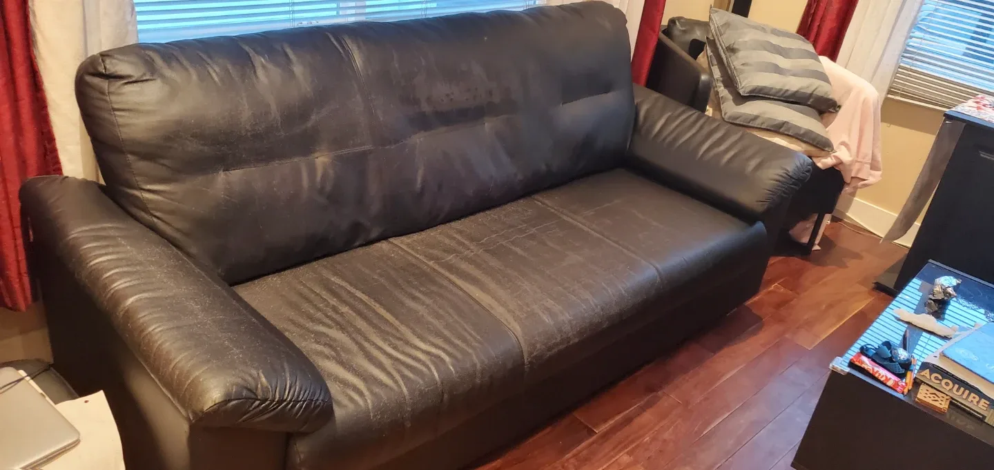 Black Loveseat, sofa, couch with Cover image indicator(5)