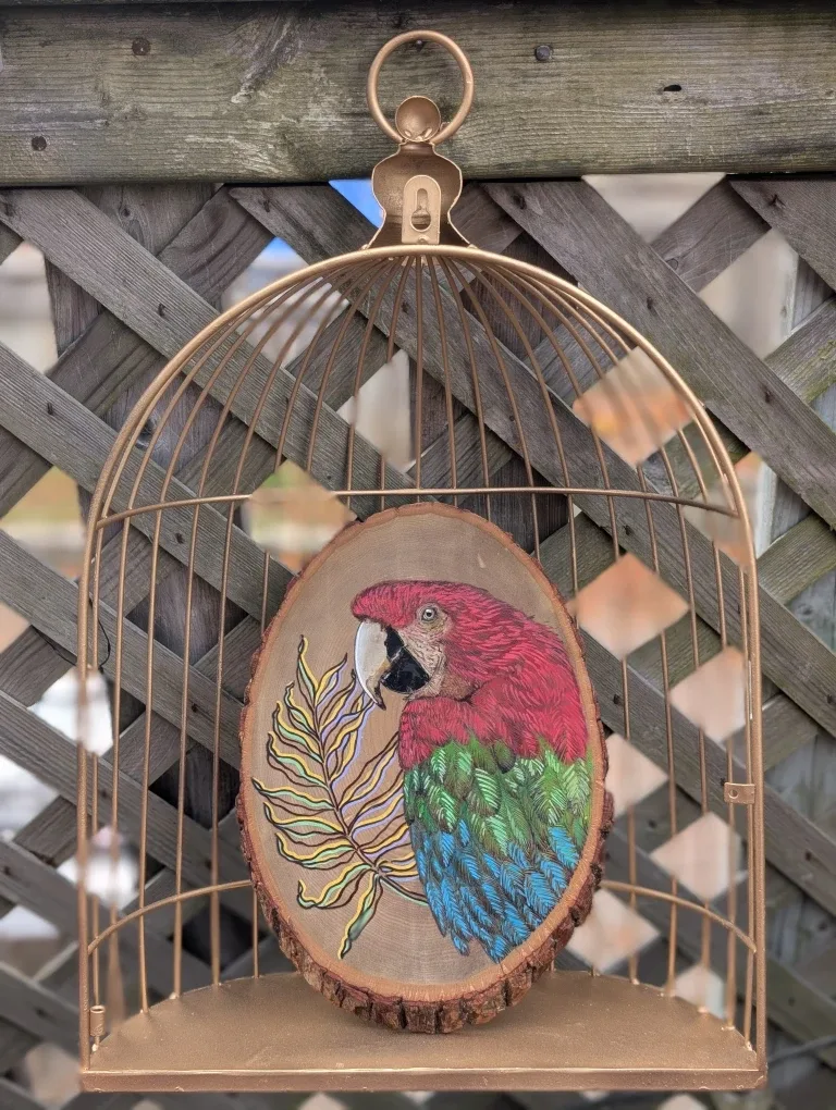 Hand-Burned Macaw on Basswood in Metal Cage image indicator(5)