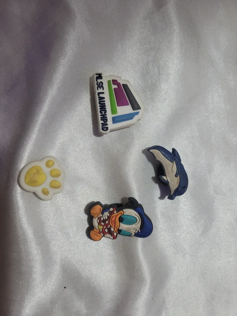 Crocs Jibbitz Charms - Donald Duck, Dolphin, Paw, Launchpad image indicator(2)