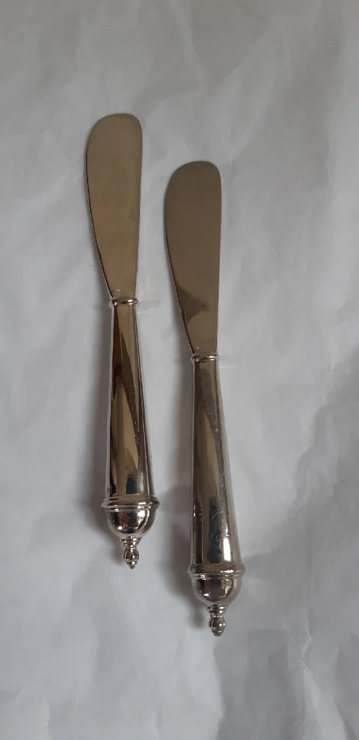 Two Silver Spreaders