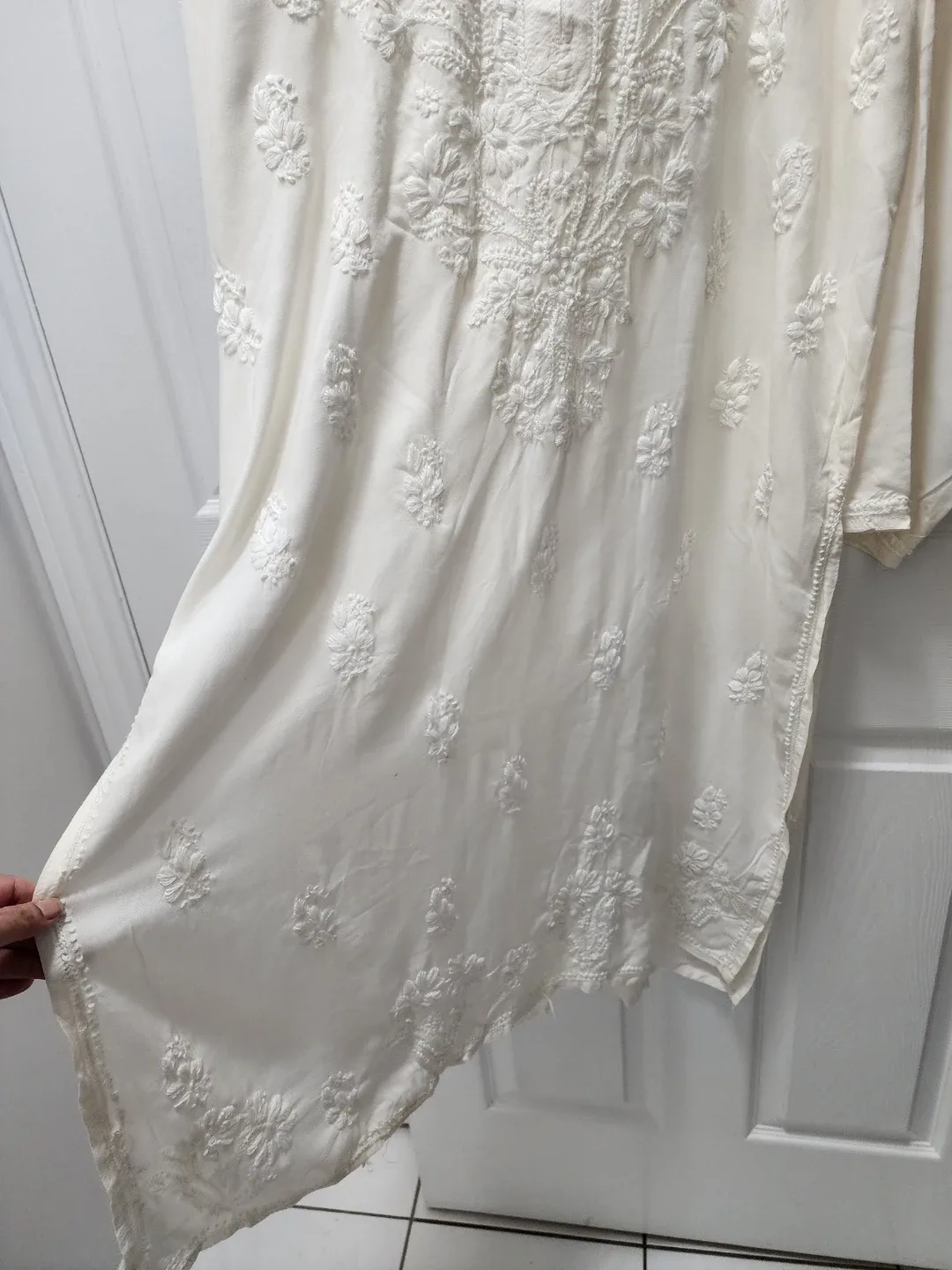 New White Embroidered Kurti - Chest 26", Length 43" 1 image indicator(3)