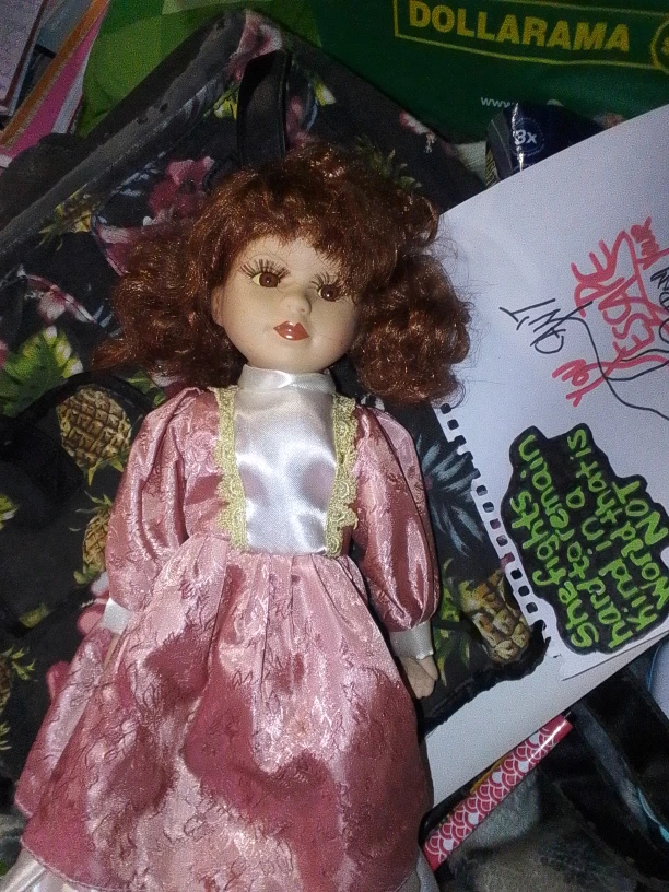 Porcelain Doll in Pink Dress