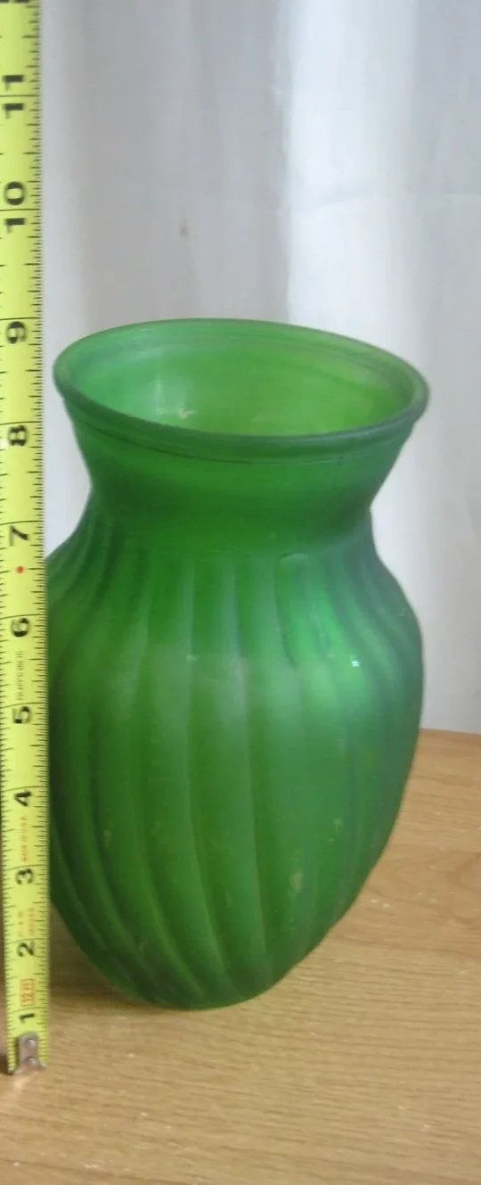 Green Glass Vase. Available and free. NO HOLDS.
