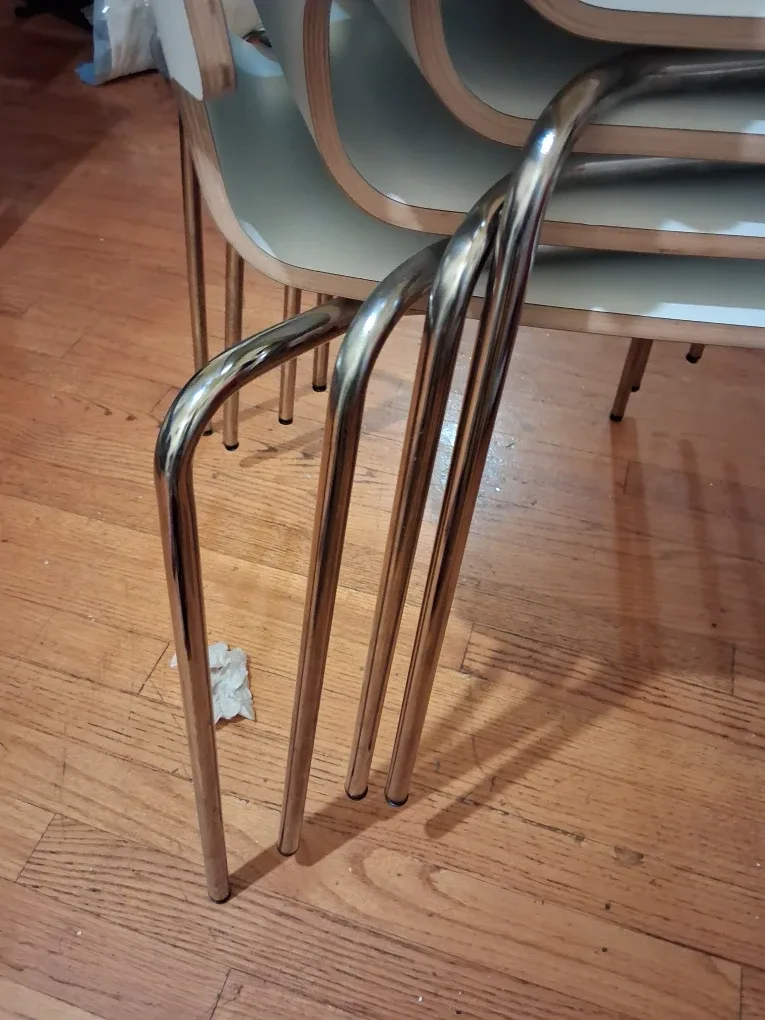 Set of 4 White Stacking Chairs image indicator(3)