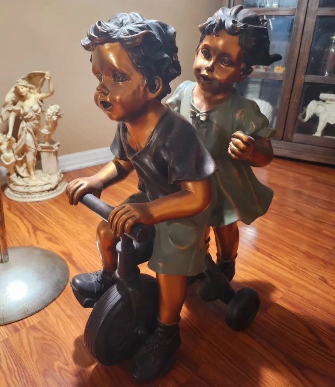 Bronze Children on Tricycle Statue