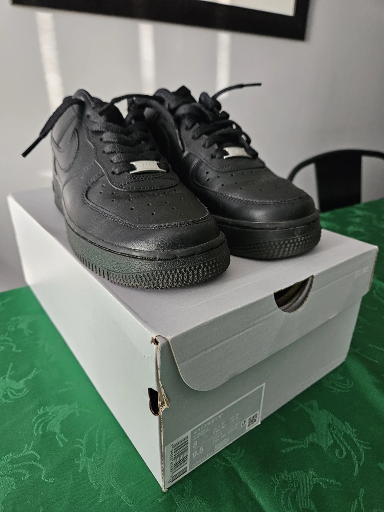 Nike Air Force 1 Black - Size 7 Men's, size 8.5 Women's
