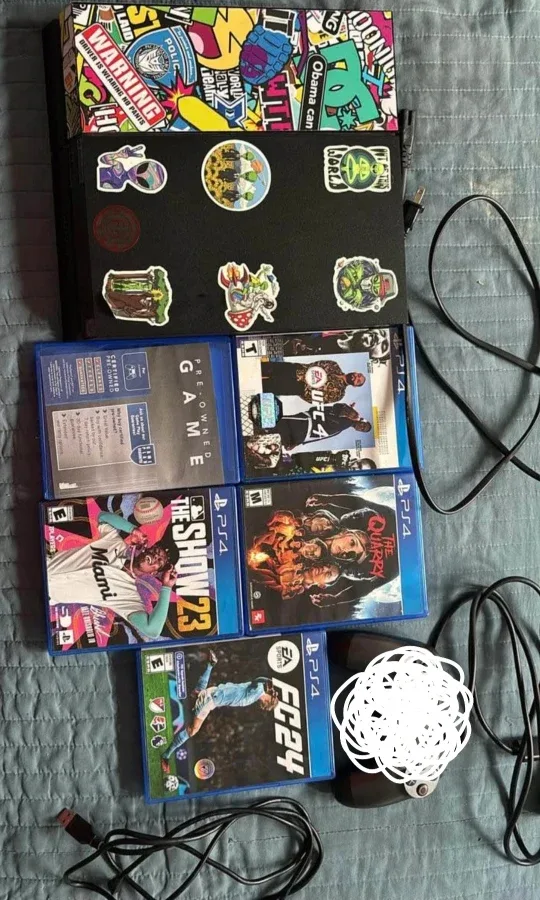 PlayStation 4 (PS4) with Games image indicator(2)