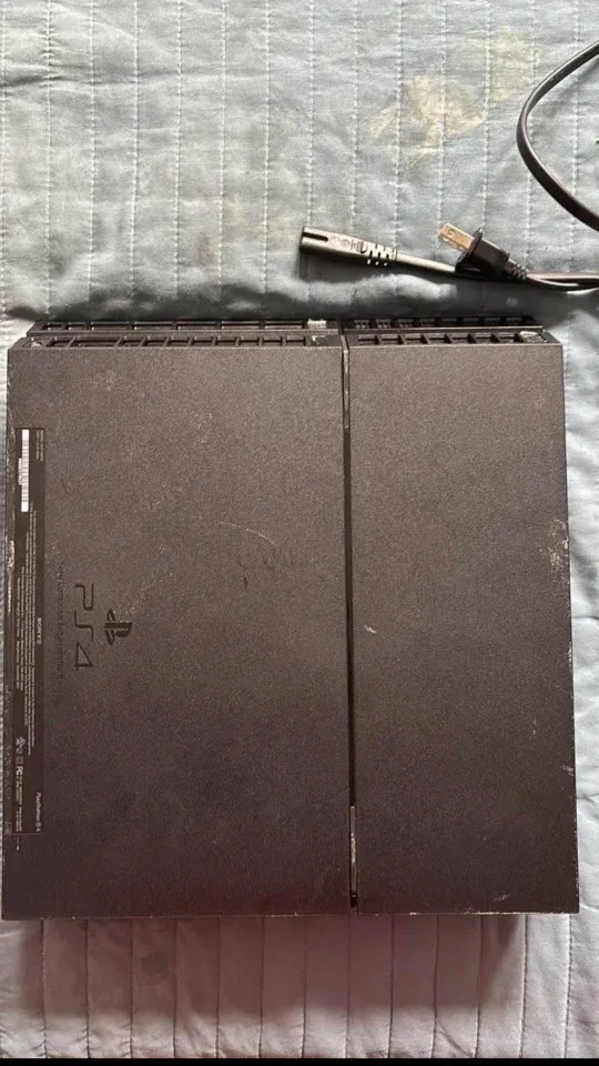 PlayStation 4 (PS4) with Games image indicator(3)